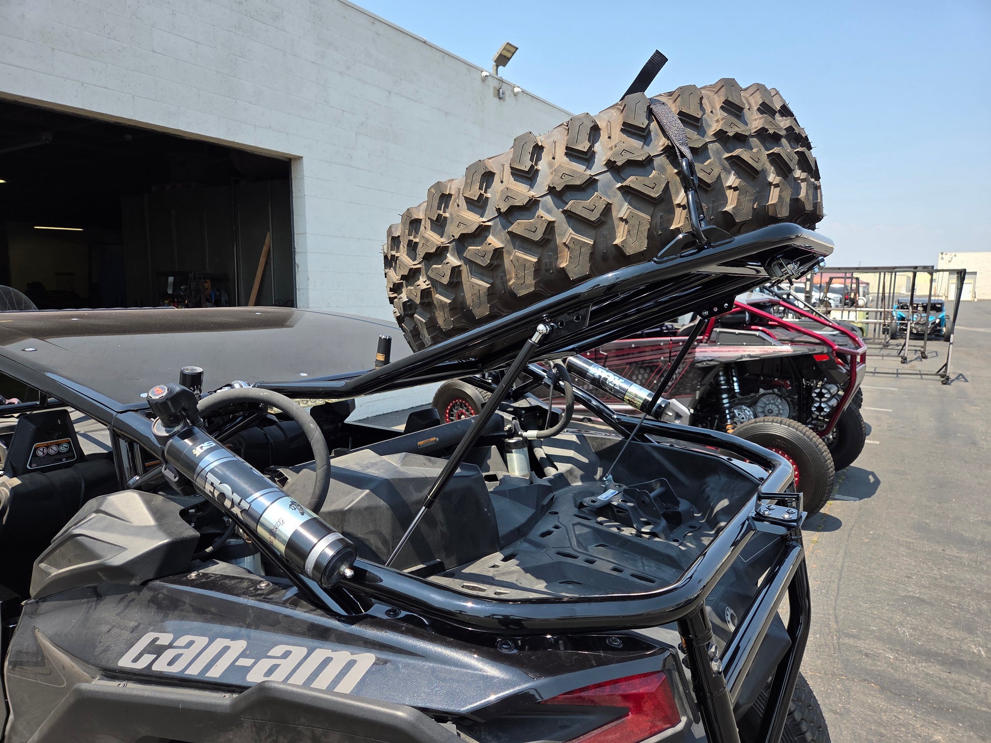Tire Carrier with shocks for the Can-am X3 w/ bumper by UTV Speed